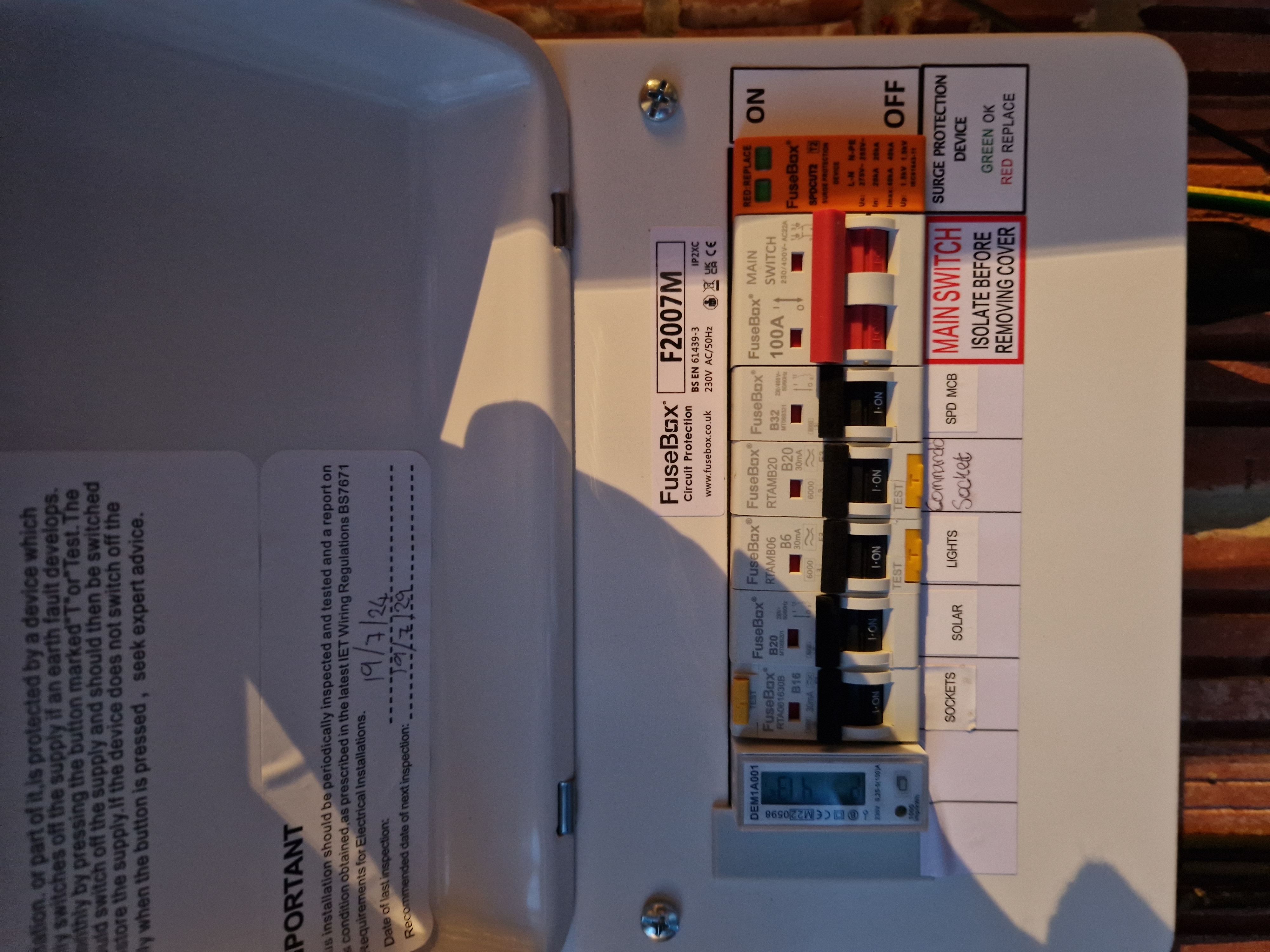 Garage consumer unit showing dedicated RCBOs for rack and sockets