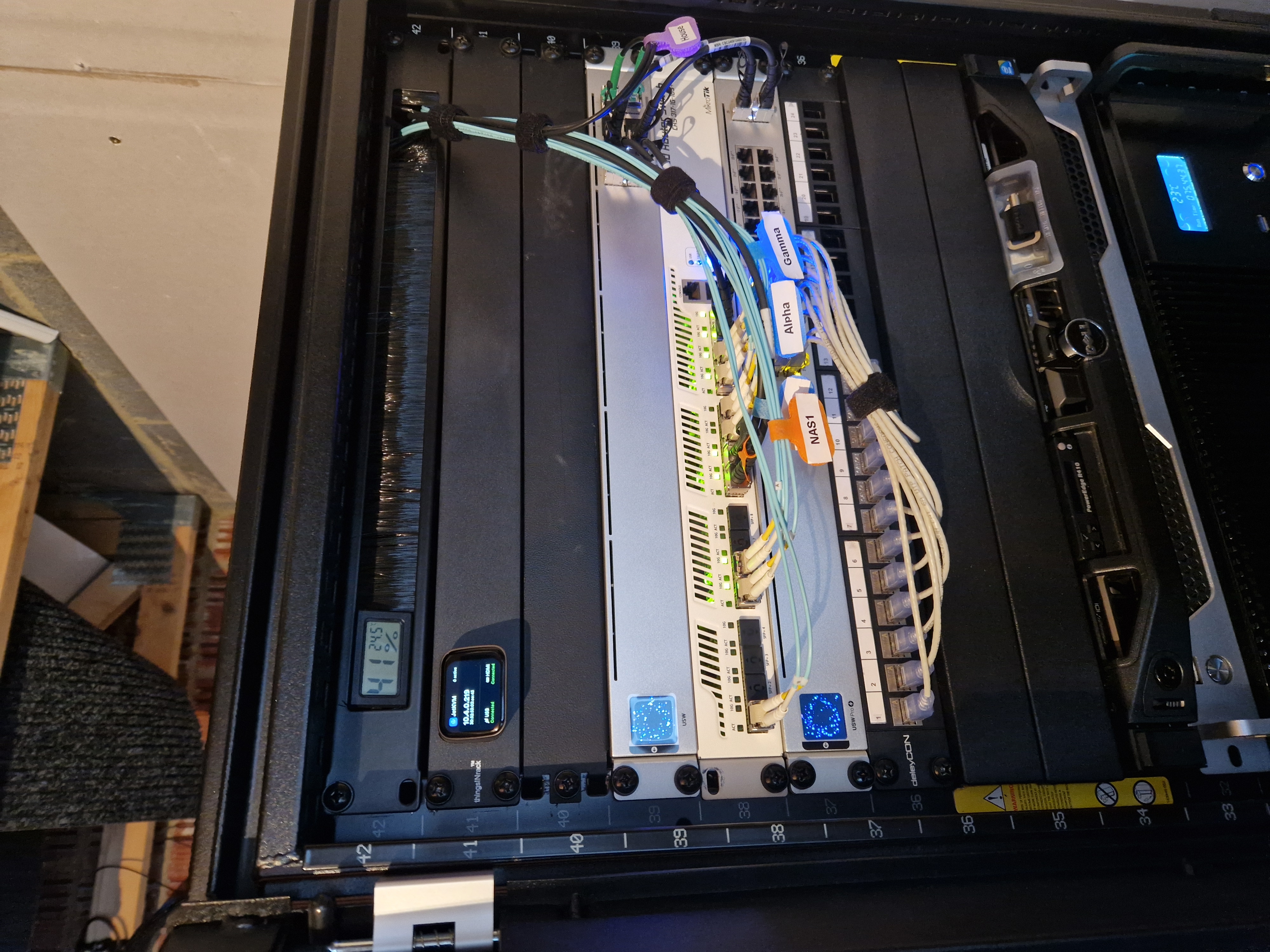 JetKVM device installed in the garage rack
